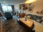 Wohnzimmer - 1 - Wohlfühlen in Jena-Ammerbach – moderne 3-Zimmer-Wohnung mit Balkon, Aufzug & Tiefgarage
