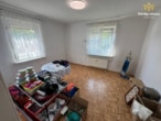 EG_Zimmer 1 - Ein Ort zum Ankommen – Gepflegtes Einfamilienhaus mit möglicher Einliegerwohnung in top Lage